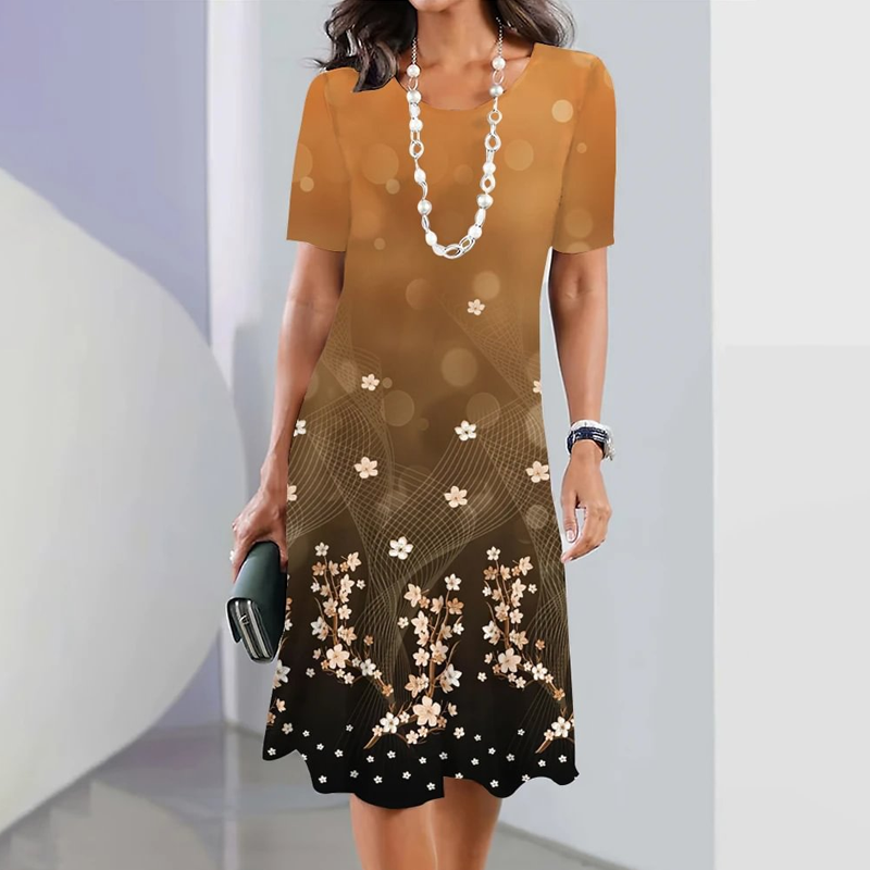 đžElegĂĄns, kerek nyakĂș nĆi ruha virĂĄgmintĂĄs kivitelben