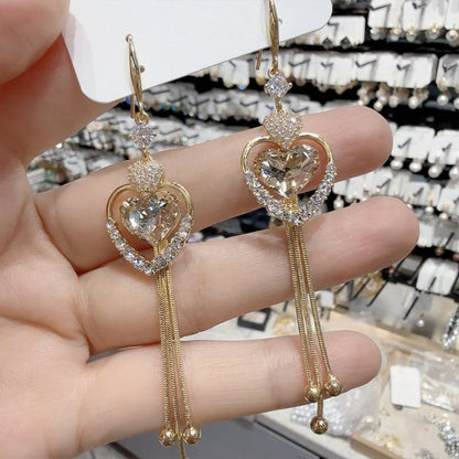 ✨ Elegáns fülbevalók szív alakú rojtokkal